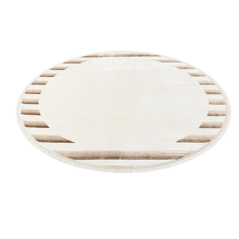 Tapis rond ivoire Jacinto