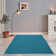 Handmade Happy cotton rug in turquoise