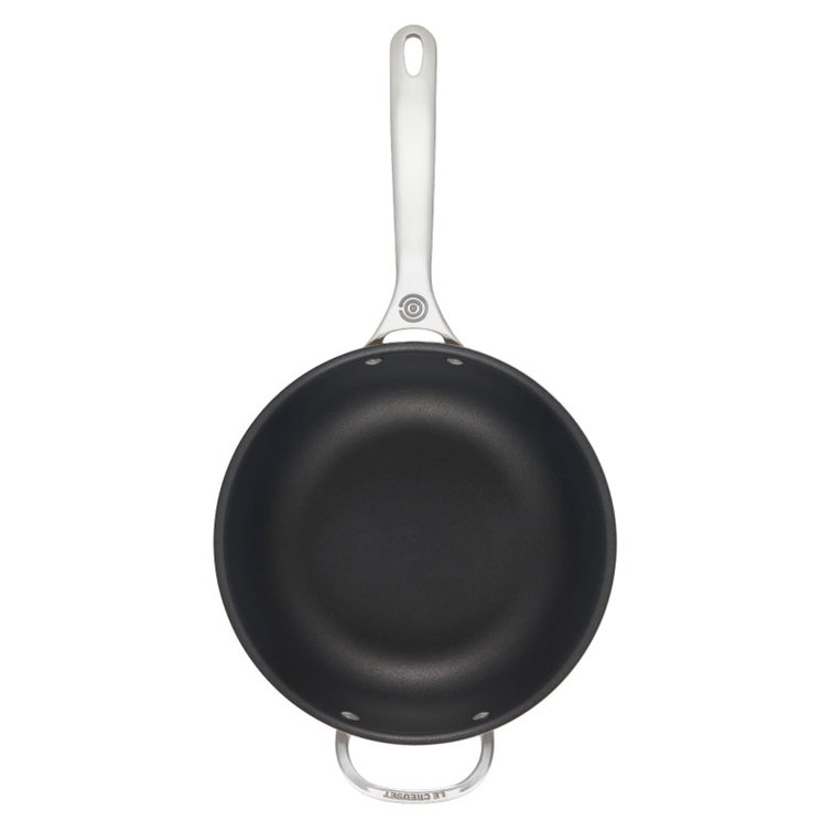 https://assets.wfcdn.com/im/95997012/resize-h755-w755%5Ecompr-r85/2144/214423311/Le+Creuset+Stainless+Steel+Nonstick+Saucier+Pan+with+Lid.jpg