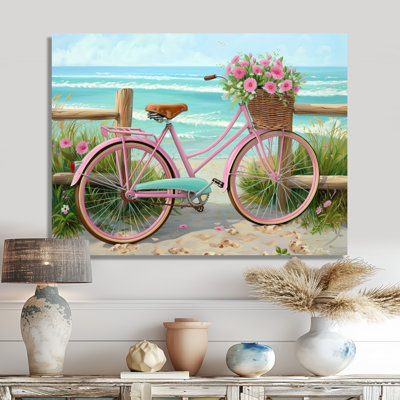 Vélo rose avec roses roses sur un chemin de plage - décoration murale bord de mer