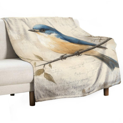 Jeté de flanelle de luxe perché sur fond brindille Bluebird