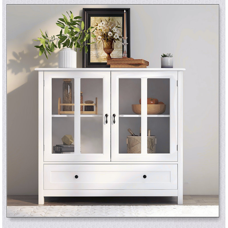 Spacious Buffet Storage Cabinet With Double Glass Doors And Unique Bell Handles For Modern Kitchens