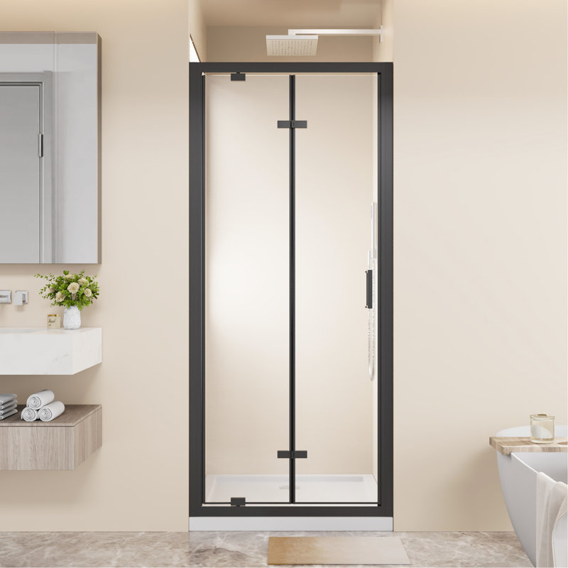 Porte de douche pivotante pliante avec cadre 32 po x 72 po peu encombrante, verre trempé transparent de 1/4 po avec poignée en acier inoxydable, installation réversible, noir