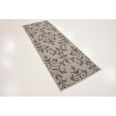 Tapis intérieur/extérieur gris à motif floral Darlene