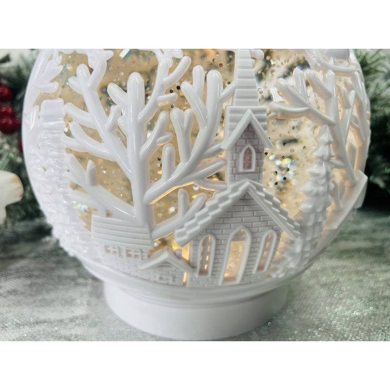 Boule à neige scène d'hiver