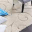 Tapis crème à motif abstrait Allaire-32701699