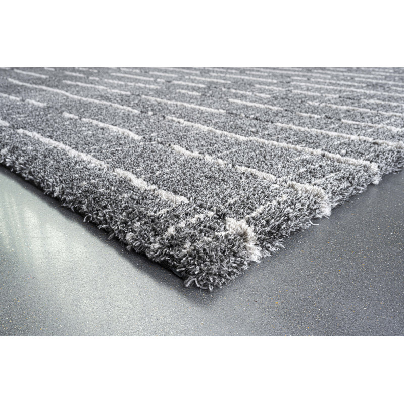 Tapis géométrique noir / blanc en polypropylène tissé à la machine, Rectangle 5 pi 3 po x 7 pi 7 po