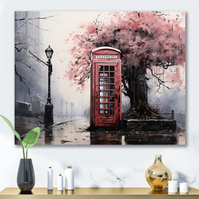 Cabine téléphonique rose qui s'évanouit