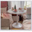 Table de salle à manger ronde blanche moderne avec plateau en panneau de fibres à densité moyenne et base en acier, idéale pour les petits espaces et la vie contemporaine-707798837-707798986-707798833