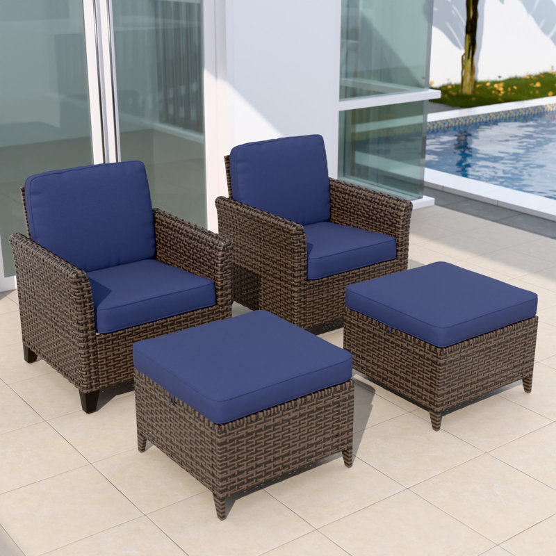 4-Piece Brown Wicker Patio Set with Blue Cushions and Ottomans