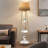 62.4'' Gold/Clear Column Floor Lamp with Outlet
