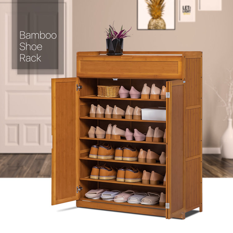 https://assets.wfcdn.com/im/96037935/resize-h755-w755%5Ecompr-r85/2021/202124359/7+Tier+Organizer+Bamboo+Cabinet+Shoe+Rack+with+Folding+Door%2C+30+Pairs+of+Shoes+Stand+for+Hallway.jpg