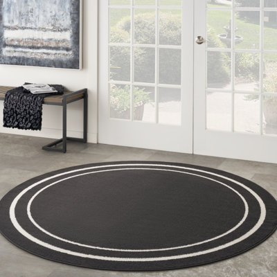 Tapis intérieur / extérieur en chenille tissé à la machine Aubreanna