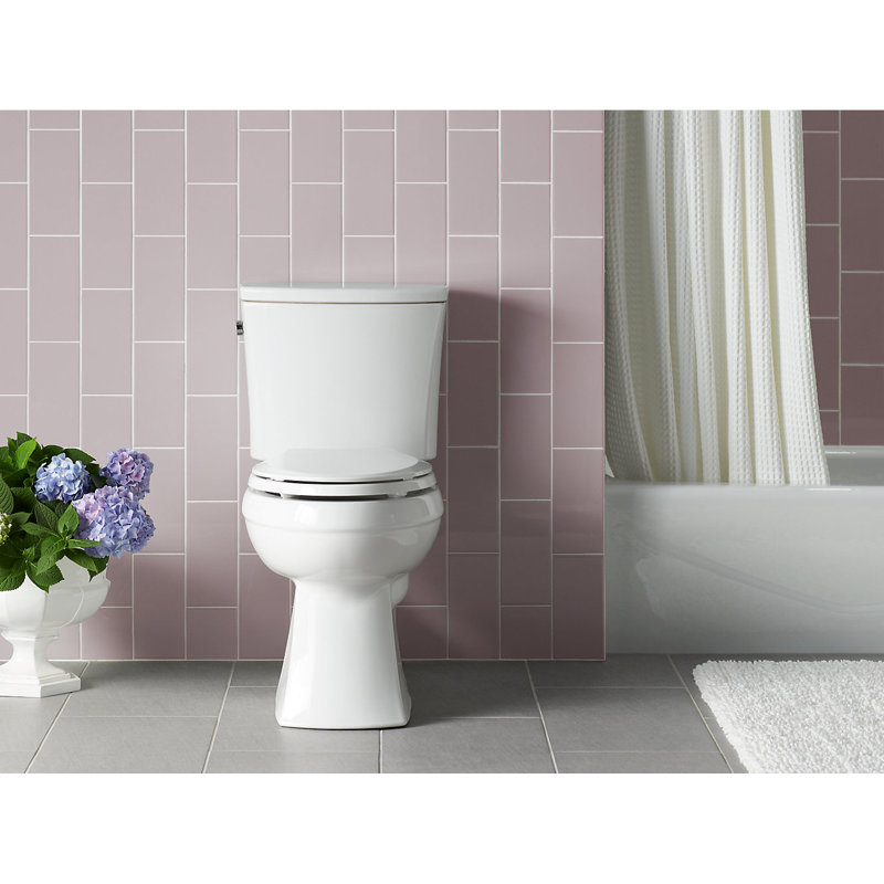Kelston™ Comfort Height Two-Piece Elongated 1.6 GPF Toilet with Aquapiston Flush Technology and Left-Hand Trip Lever