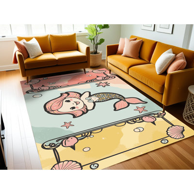 Tapis pour enfants East Urban Home Mermaids