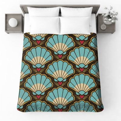 Couvre-lit matelassé à motif de coquillages festonnés
