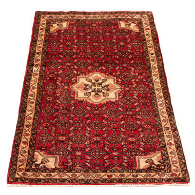 Splendid piece of work that is woven in Turkey with a re-interpretation of village Persian designs. The vintage and distressed look make this hand-knotted wool rug a natural standout.