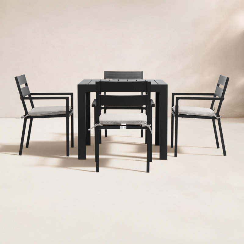 Eartha 4 - Person Patio Dining Set with Square Table , Cushions Included, Cast Silver Sunbrella®, Black