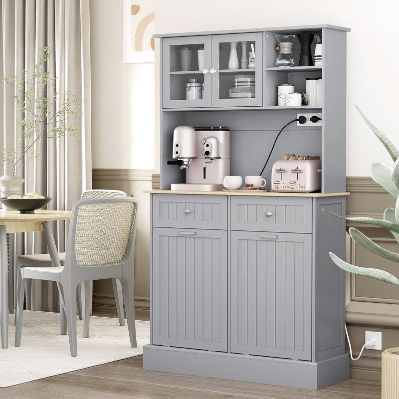 68" Gray Kitchen Pantry Storage With Charging Element. Freestanding Cabinet Glass Doors & Adjustable Shelf. Versatile In Function. 2 Tilt Out Trash Cabinets. Built-In Ac Outlets And Ports. Spacious