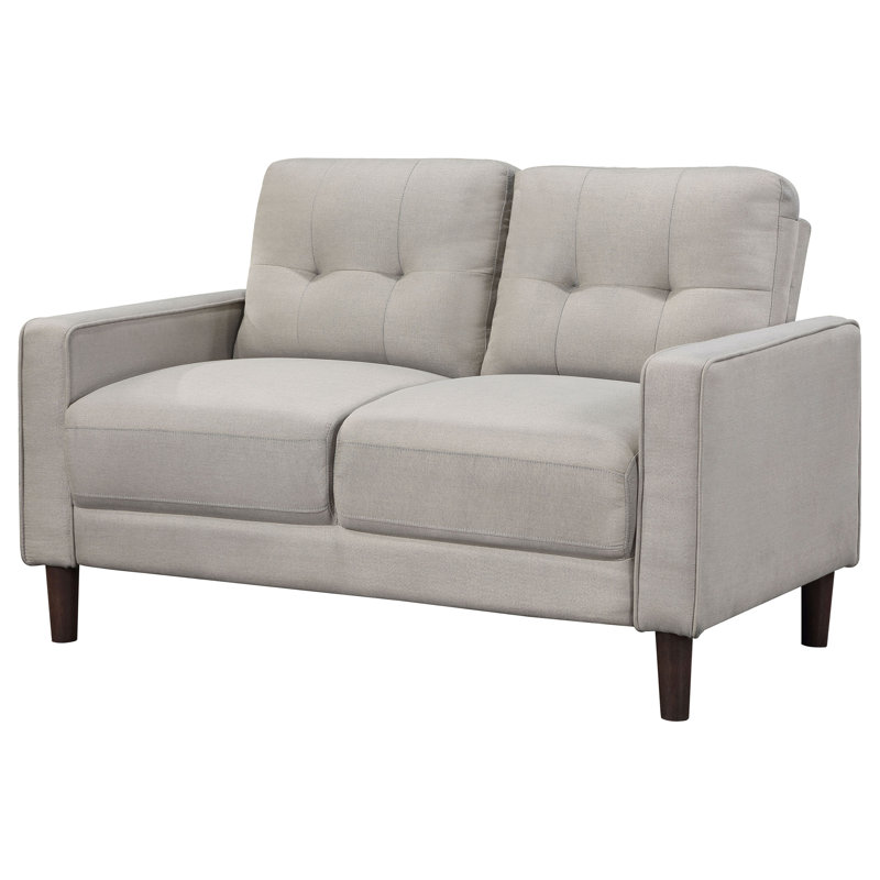 Causeuse capitonnée beige