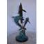 Statue de trois dauphins sautant sur l'océan en bronze 12 po x 12 po x H 25 po.