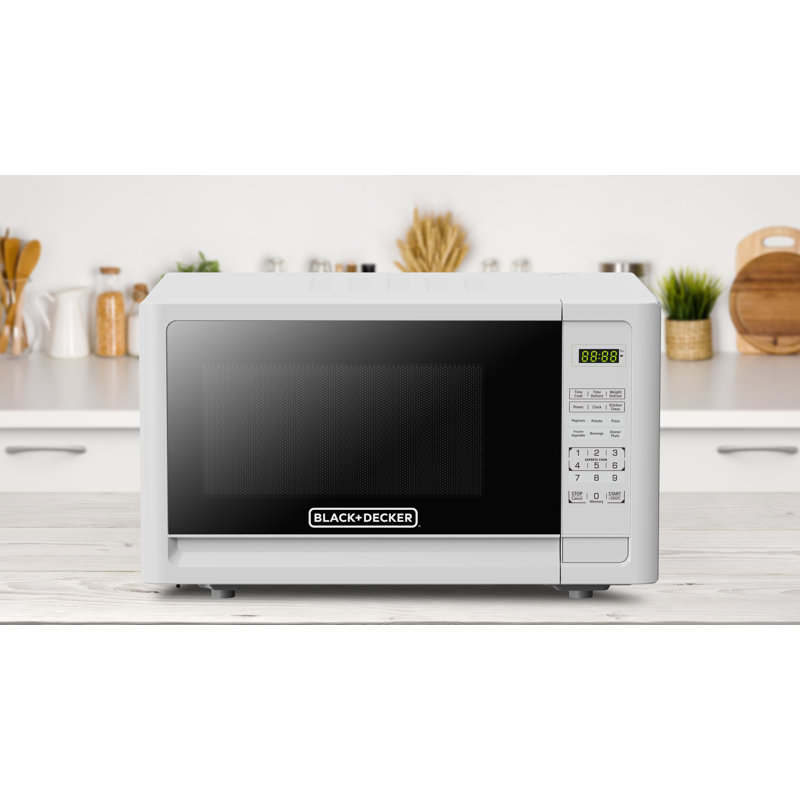 Micro-onde de comptoir 16,1 po 1,1 pi³ Black + Decker, Blanc