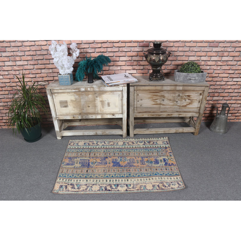 Tapis de porte turc rétro tissé à la main dans des motifs géométriques bleus et beiges pour un décor de style bohème