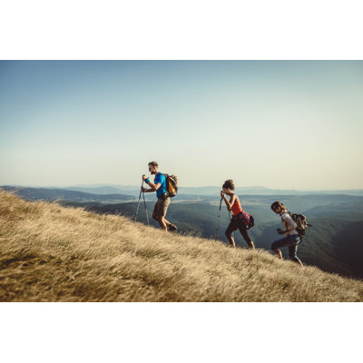 Group of People Hiking by Sanjeri