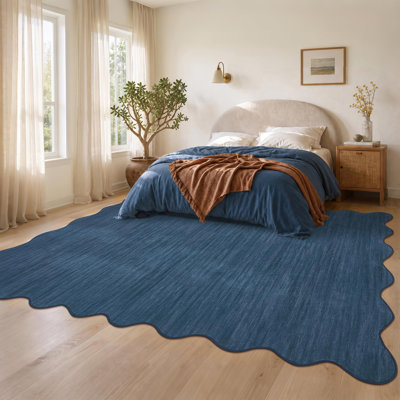 Tapis festonné à bordure festonnée