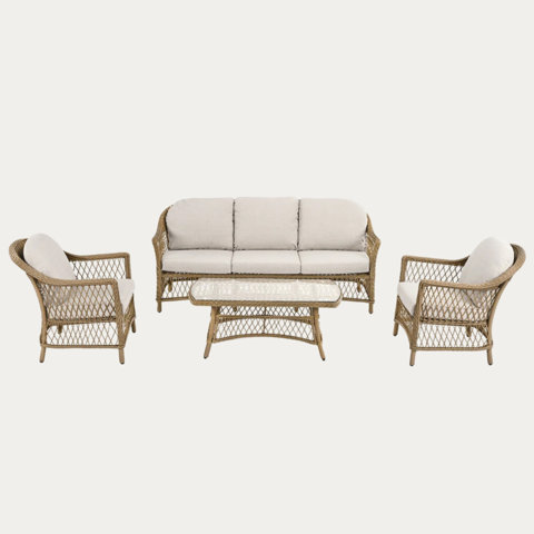 Wicker sofa set with cream cushions.