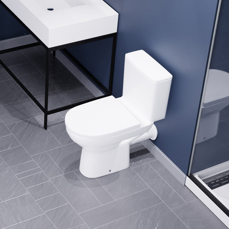 Toilette allongée deux pièces en blanc avec couvercle à fermeture en douceur, chasse d'eau 1,6 GPF, compatible avec la pompe Macerator (toilette seulement)