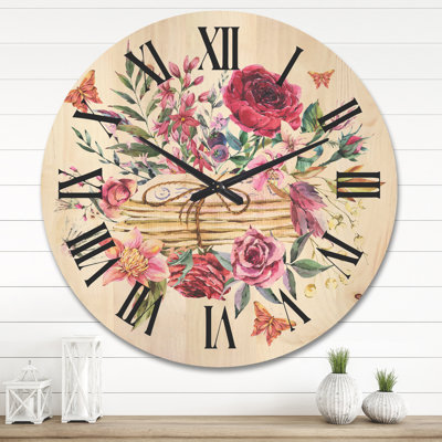 Horloge murale en bois avec lettres et fleurs sauvages