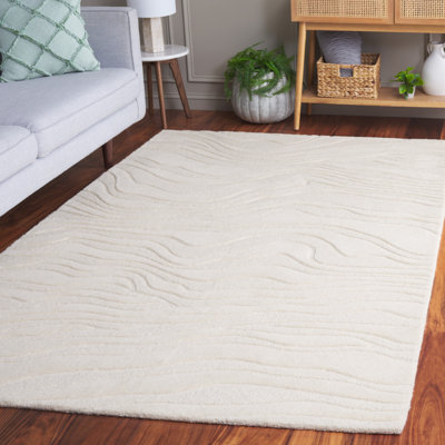 Tapis ivoire en laine / coton touffeté à la main Rodeo Drive