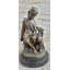 Sculpture de jeune fille avec chiot Ocracoke