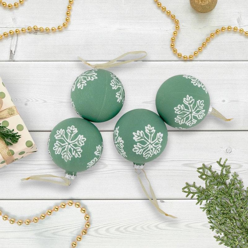 Boule de Noël verte en verre avec flocons de neige blancs 3 po