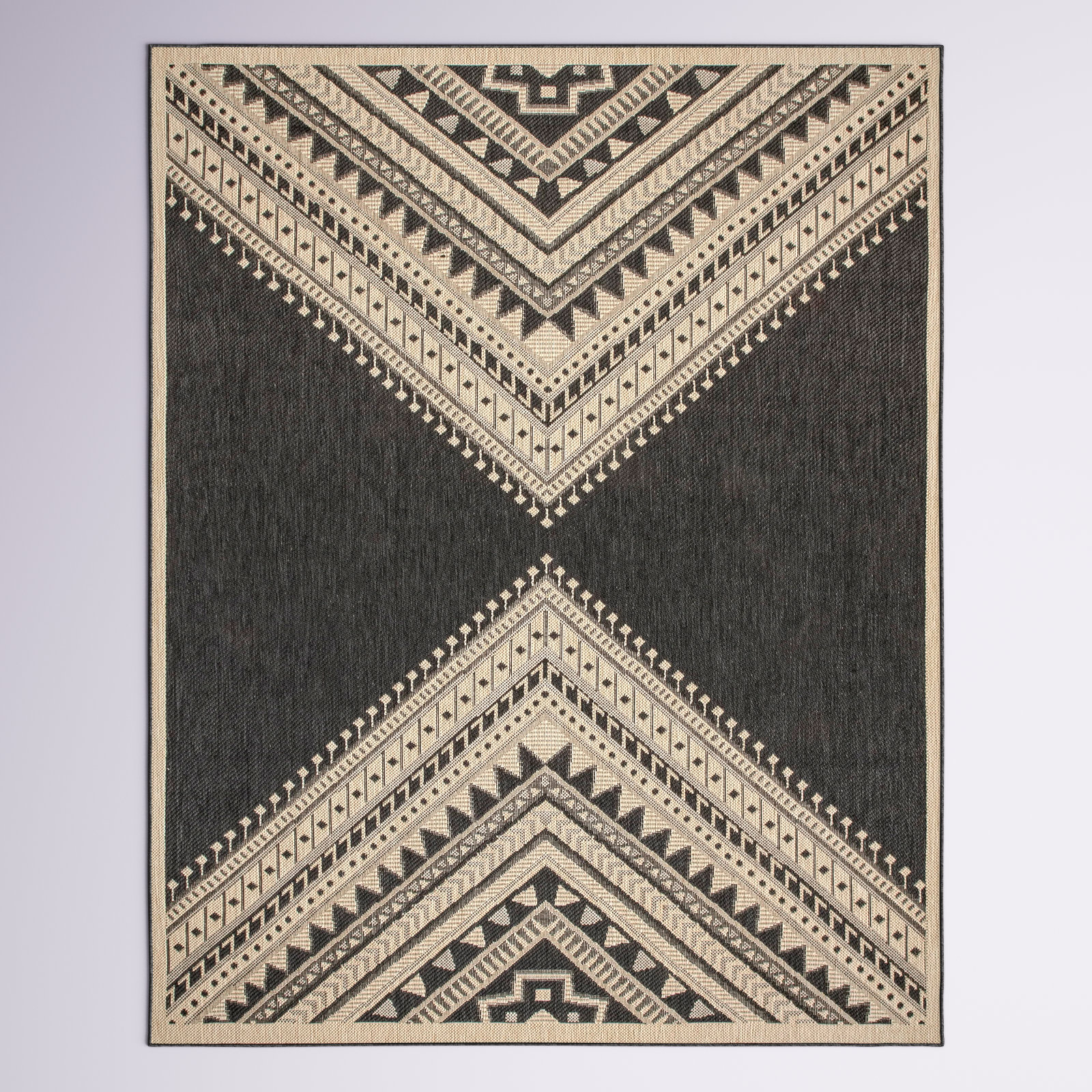 https://assets.wfcdn.com/im/96142244/compr-r85/2578/257808187/cankton-southwestern-power-loom-charcoalivory-indooroutdoor-patio-rug.jpg