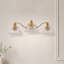 Applique murale traditionnelle 3 lumières 24 po en laiton antique avec abat-jour en verre transparent 24 po