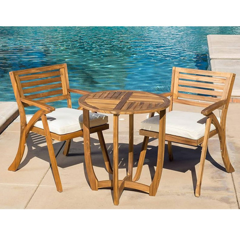 Ensemble repas d'extérieur en bois 3 pièces KD avec coussins Hermosa