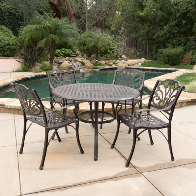 Ralls Round 4 - Person 48" Long Aluminum Outdoor Dining Set by Fleur De Lis Living