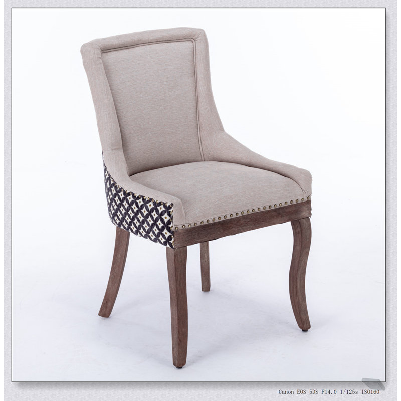Chaise de salle à manger Ultra Side avec tissu épais, dossier haut et rivets décoratifs pour un confort élégant