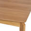Table de salle à manger de style Mid-Century moderne avec des pieds fuselés sculptés et des découpes audacieuses