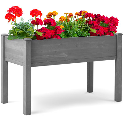 Jardinière surélevée de 122 x 61 x 76 cm (48 x 24 x 30 pouces), en bois massif gris, idéale pour la culture de fleurs et d'herbes aromatiques en extérieur. Supporte jusqu'à 136 kg (300 lb). Revêtement à base d'eau. Jardinage confortable. Hauteur : 76 cm (30 pouces). Dimensions : 122 x 61 cm (48 x 24 pouces). Fabriqué en bois massif.