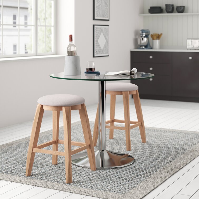 https://assets.wfcdn.com/im/96172301/resize-h755-w755%5Ecompr-r85/7870/78701366/Ember+Round+Glass+Dining+Table.jpg