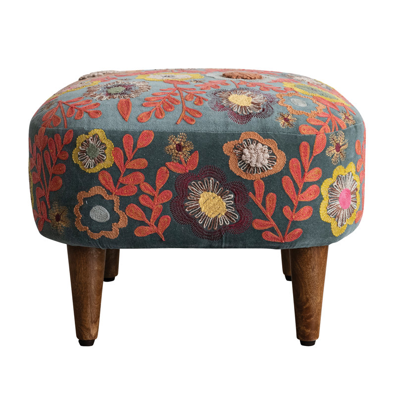 Tabouret en bois avec coussin en mousse
