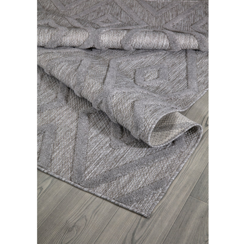Tapis rectangulaire gris en polypropylène tissé à la machine Sherando, Rectangle 6 pi 7 po x 9 pi 6 po