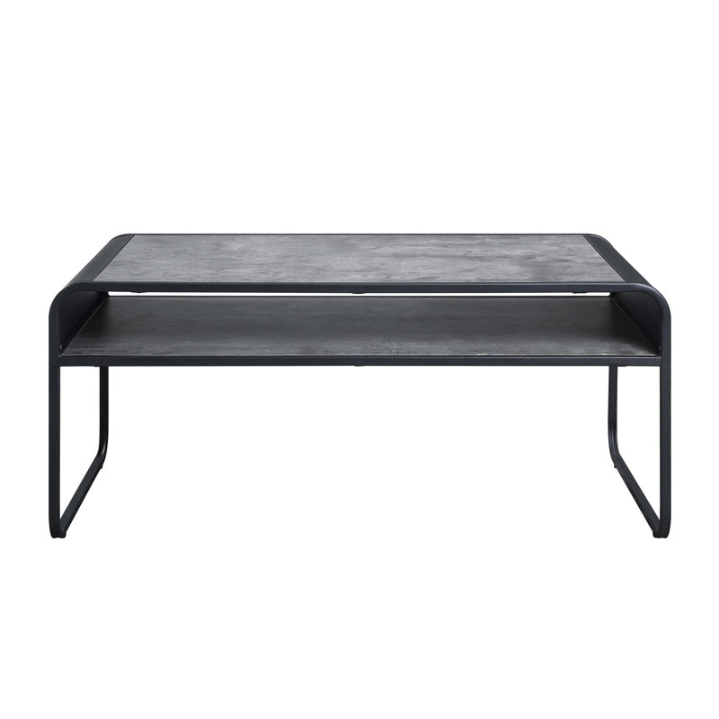 Table basse moderne à finition noire avec tablette, structure en métal durable et plateau gris imitation béton pour un salon luxueux