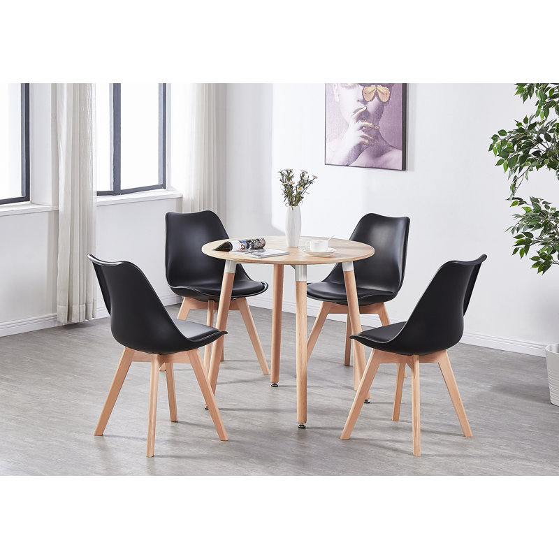 Sade 4 Person Dining Set - a Round Plastic Dining Table with Wooden Legs and a Set of 4 Faux Leather Cushion Padded Dining Chairs for Dining Room - Modern Dining Table Set