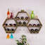 Étagère flottante hexagonale en bois massif Tanesha