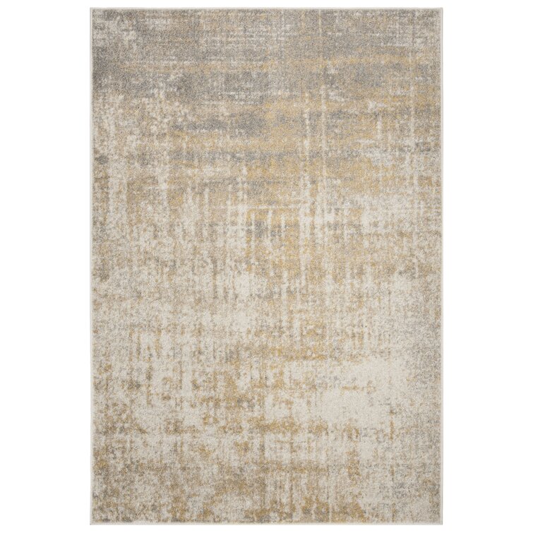 https://assets.wfcdn.com/im/96204616/resize-h755-w755%5Ecompr-r85/5721/57217607/Connie+Cream%2FGold+Rug.jpg