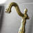 Kingston Brass Heirloom Two-Handle 3-Hole Deck Mount Bridge Bathroom Faucet with Brass Pop-Up-69607271